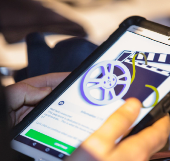 using a tablet for a team building quiz play activity