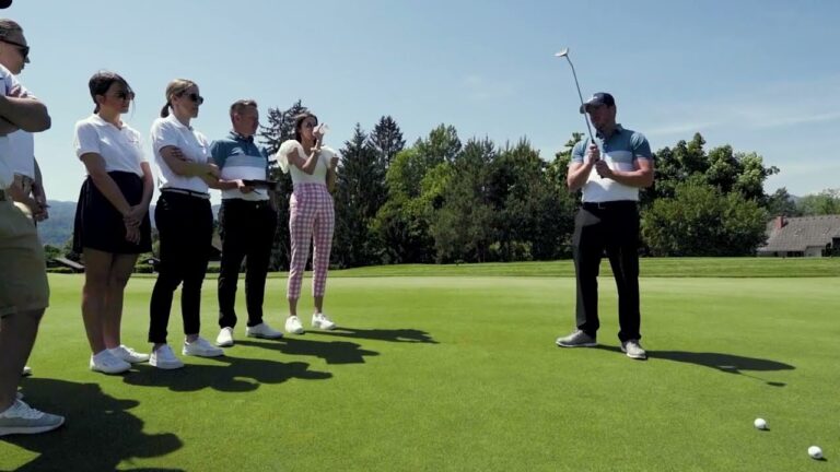 professional golf coach and his pupils during an introductory golf course