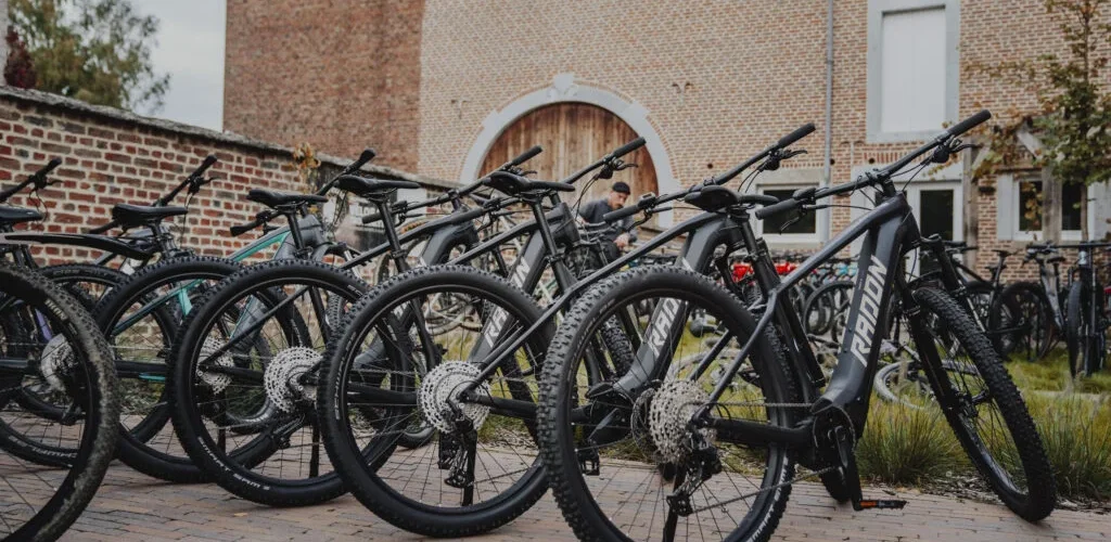 Electric bikes ready for an outdoor team-building activity