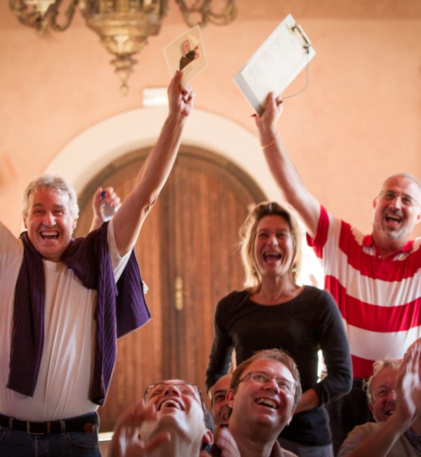 a group of happy people who look like they've won something