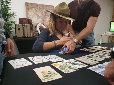 Participant concentrating on a riddle during a corporate Escape Box game