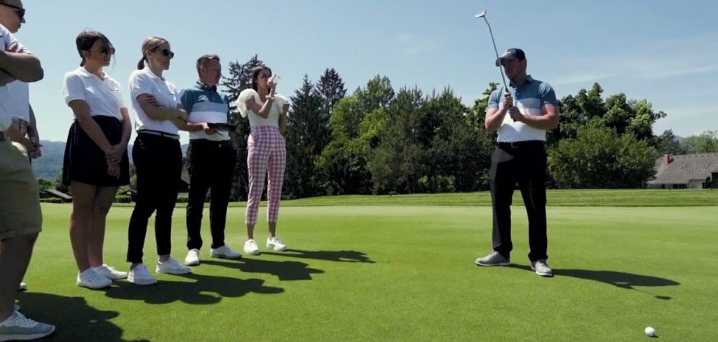 professional golf coach and his pupils during an introductory golf course